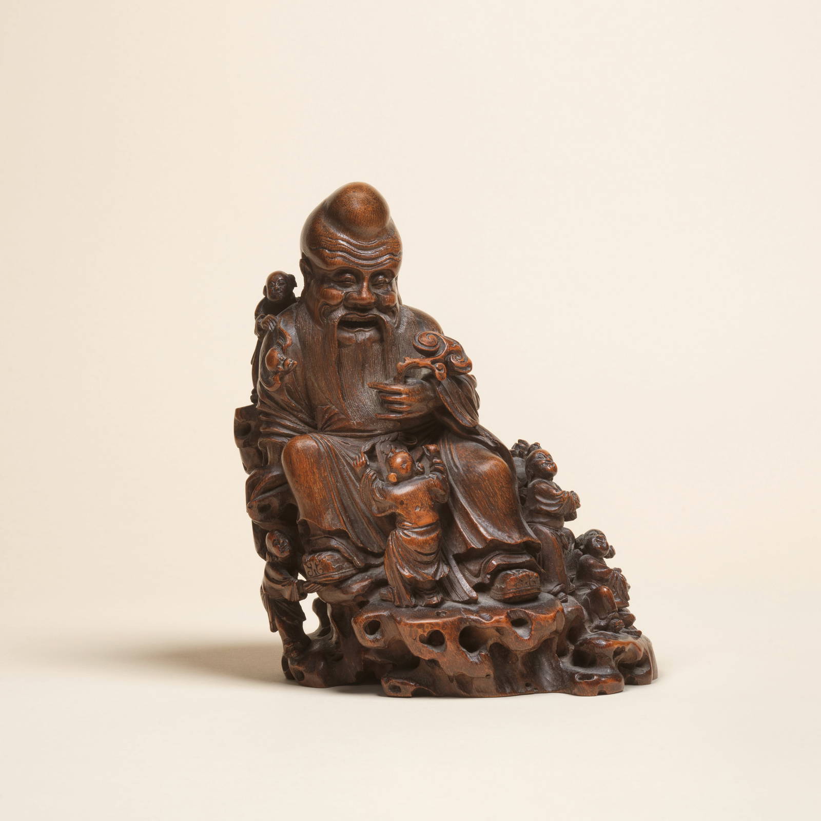 A LARGE BAMBOO 'SHOULAO AND BOYS' GROUP 17th/18th century