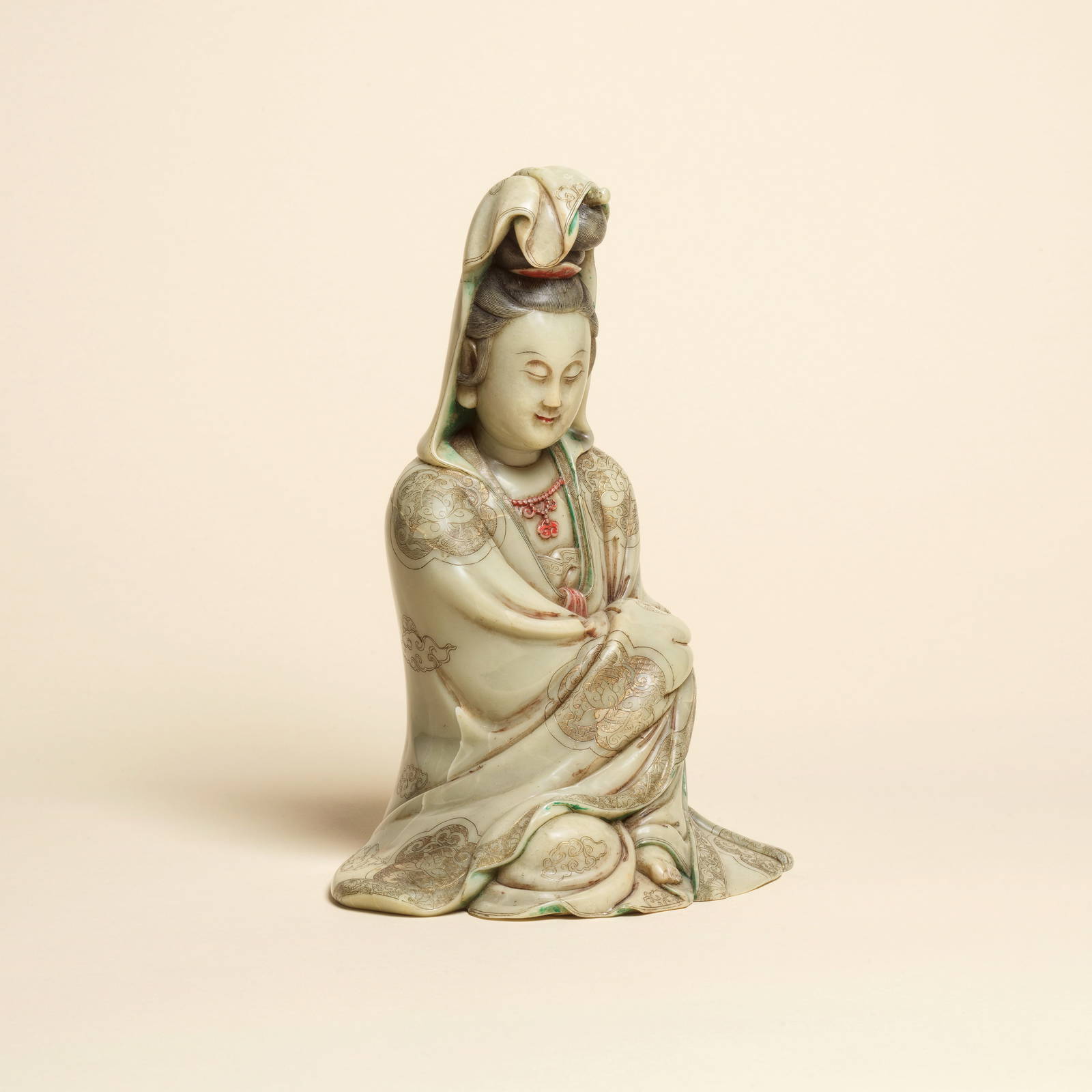 A LARGE SOAPSTONE CARVING OF GUANYIN 18th century