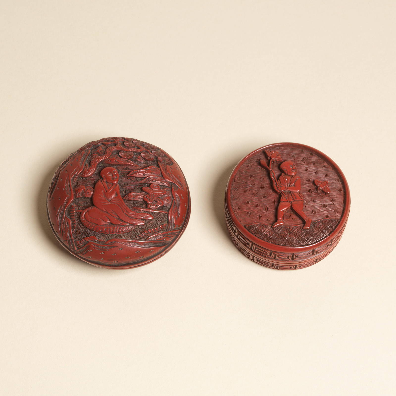 TWO CARVED CINNABAR LACQUER CIRCULAR BOXES AND COVERS 16th/17th century (4)