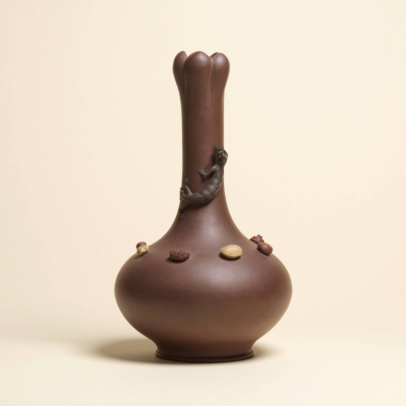 A YIXING STONEWARE GARLIC-NECK 'CHILONG AND NUTS' VASE Late Qing Dynasty/Republic Period