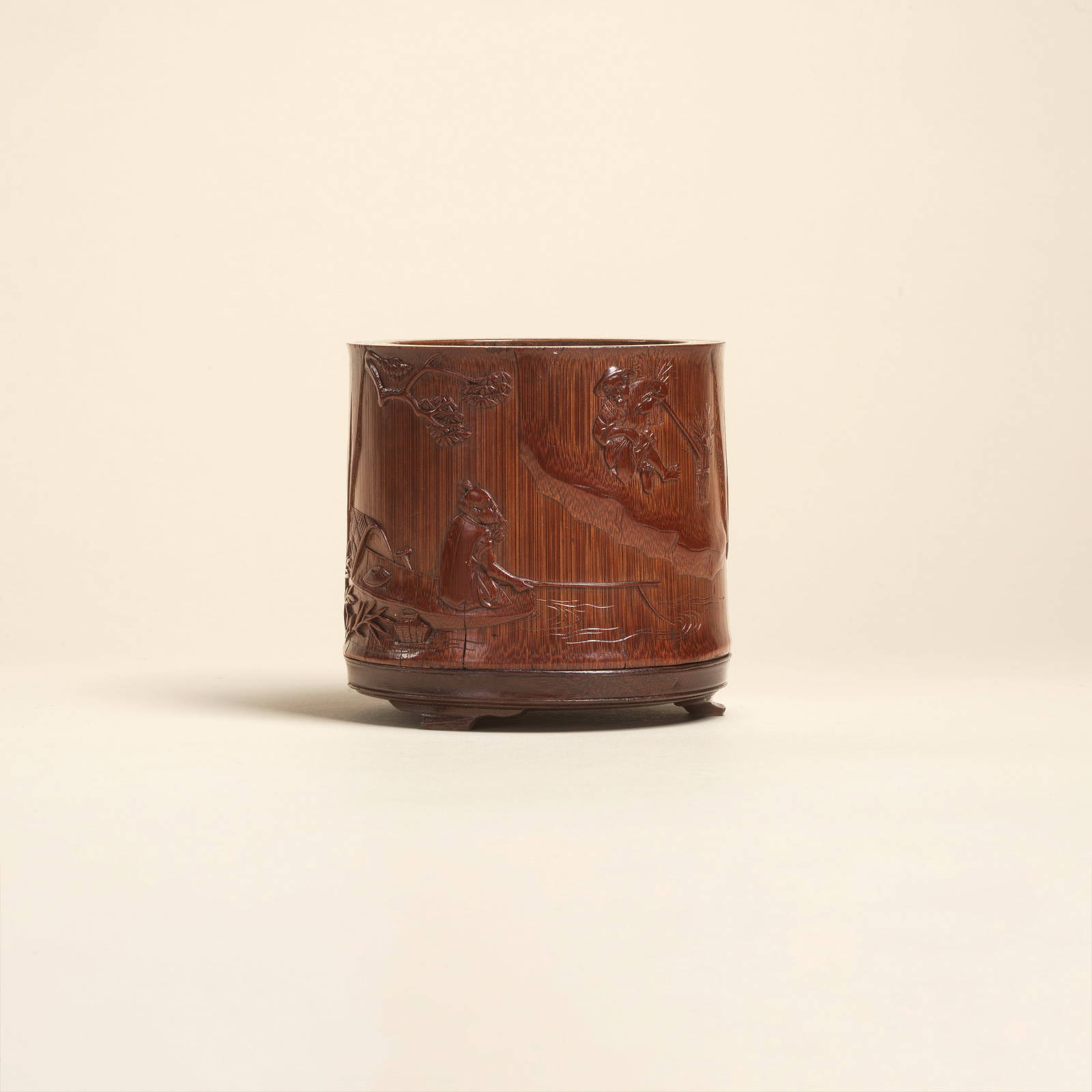 A RARE CARVED BAMBOO 'FISHERMAN AND WOODCUTTER' BRUSHPOT, BITONG 18th century