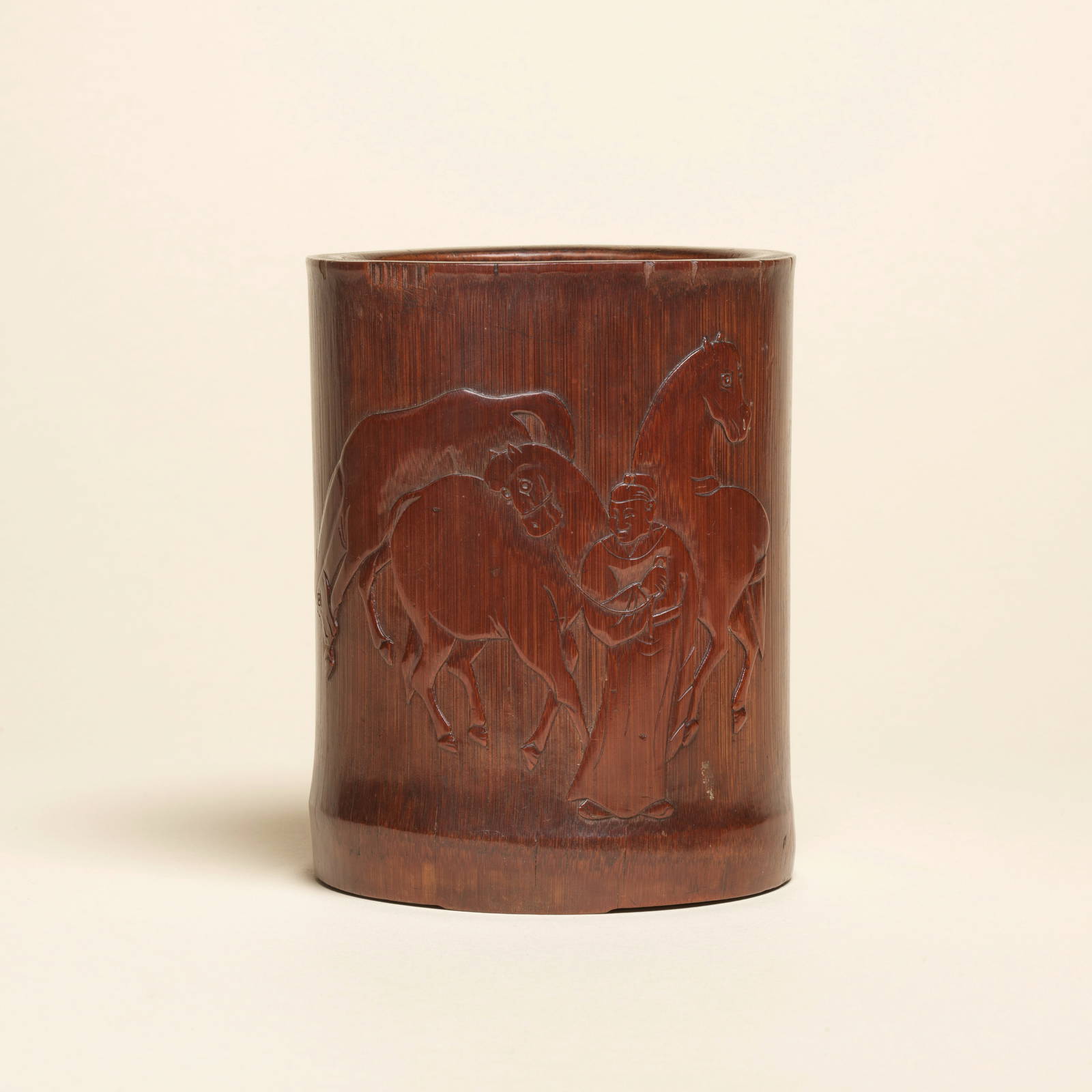 A RARE CARVED BAMBOO 'HORSES AND OFFICIAL' BRUSHPOT, BITONG 18th century