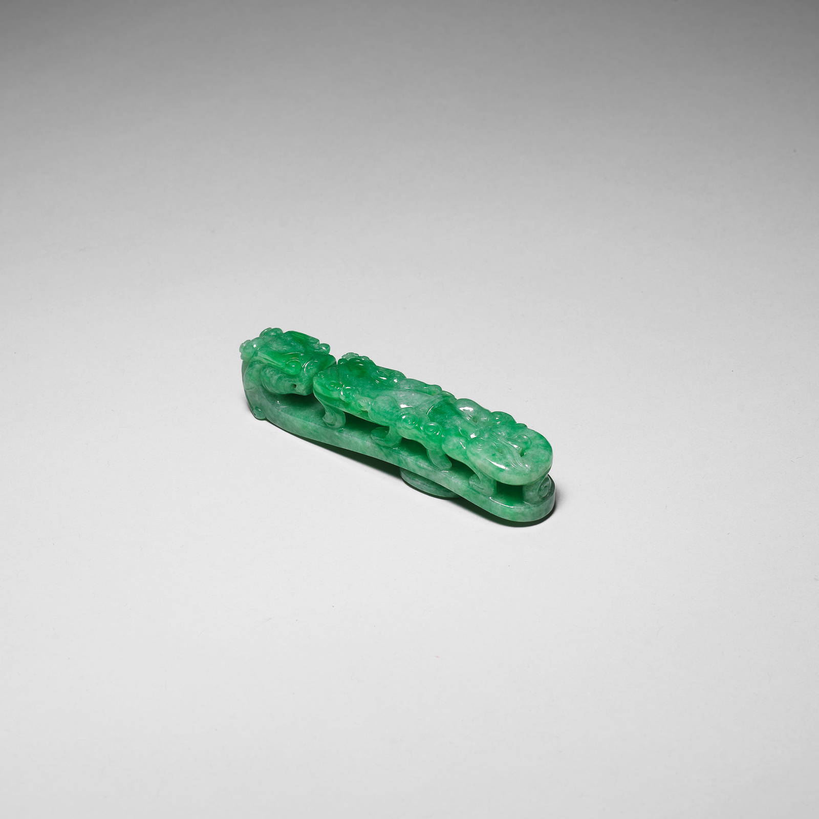 A FINE JADEITE 'CHILONG' BELT HOOK 19th century