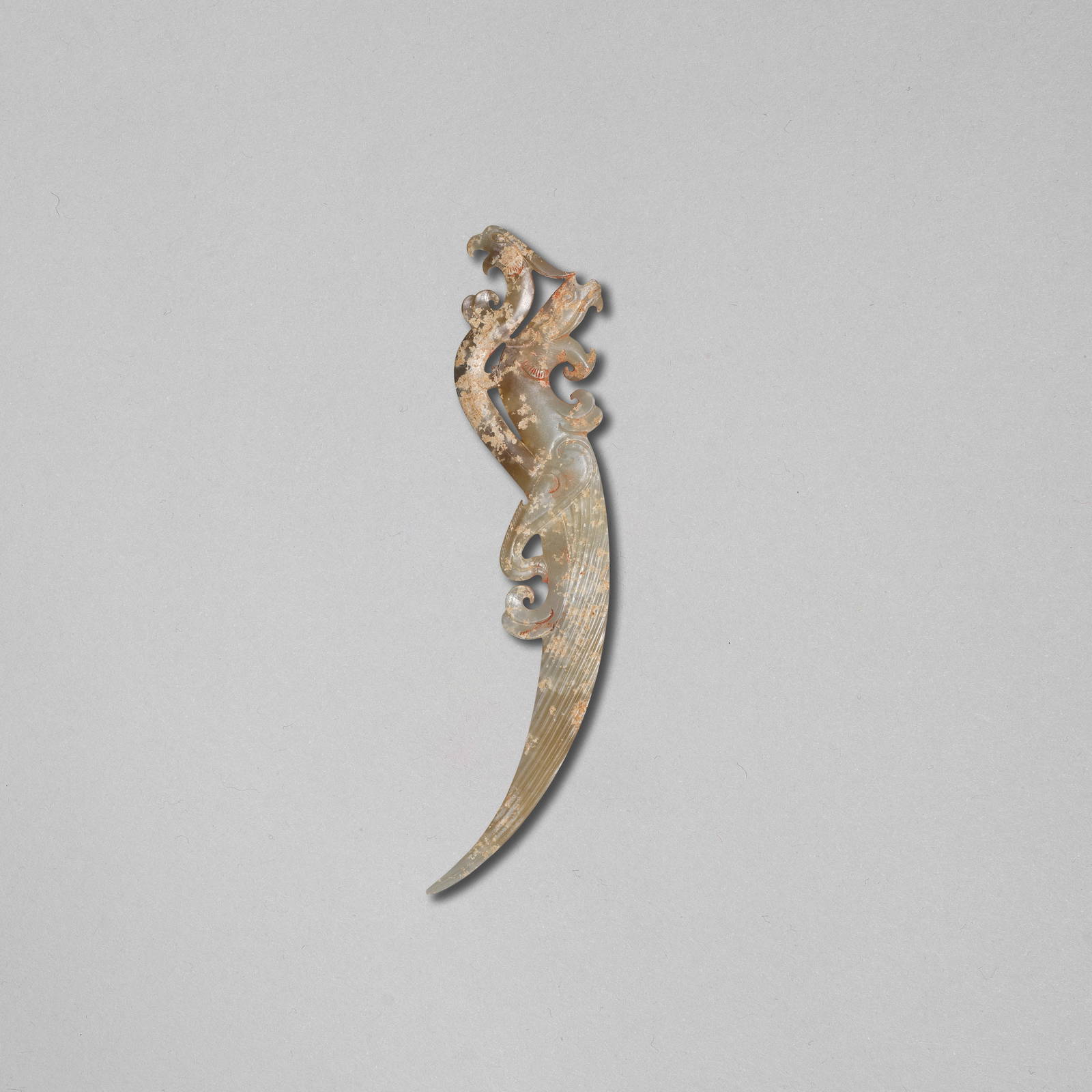 A RARE PALE GREEN AND RUSSET JADE 'DRAGON AND PHOENIX' PENDANT, XI Warring States Period (3)