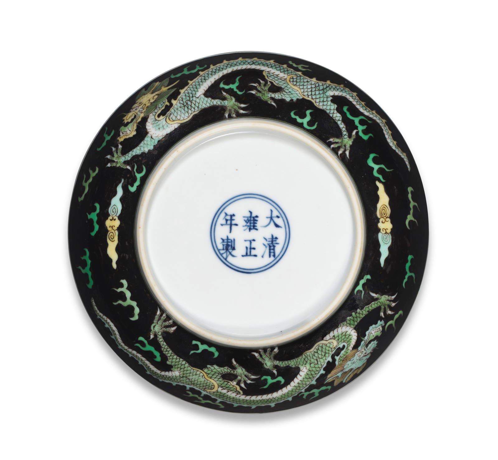 A RARE FAMILLE VERTE AND BLACK ENAMEL 'DRAGONS' SAUCER-DISH Yongzheng six-character mark and pos...