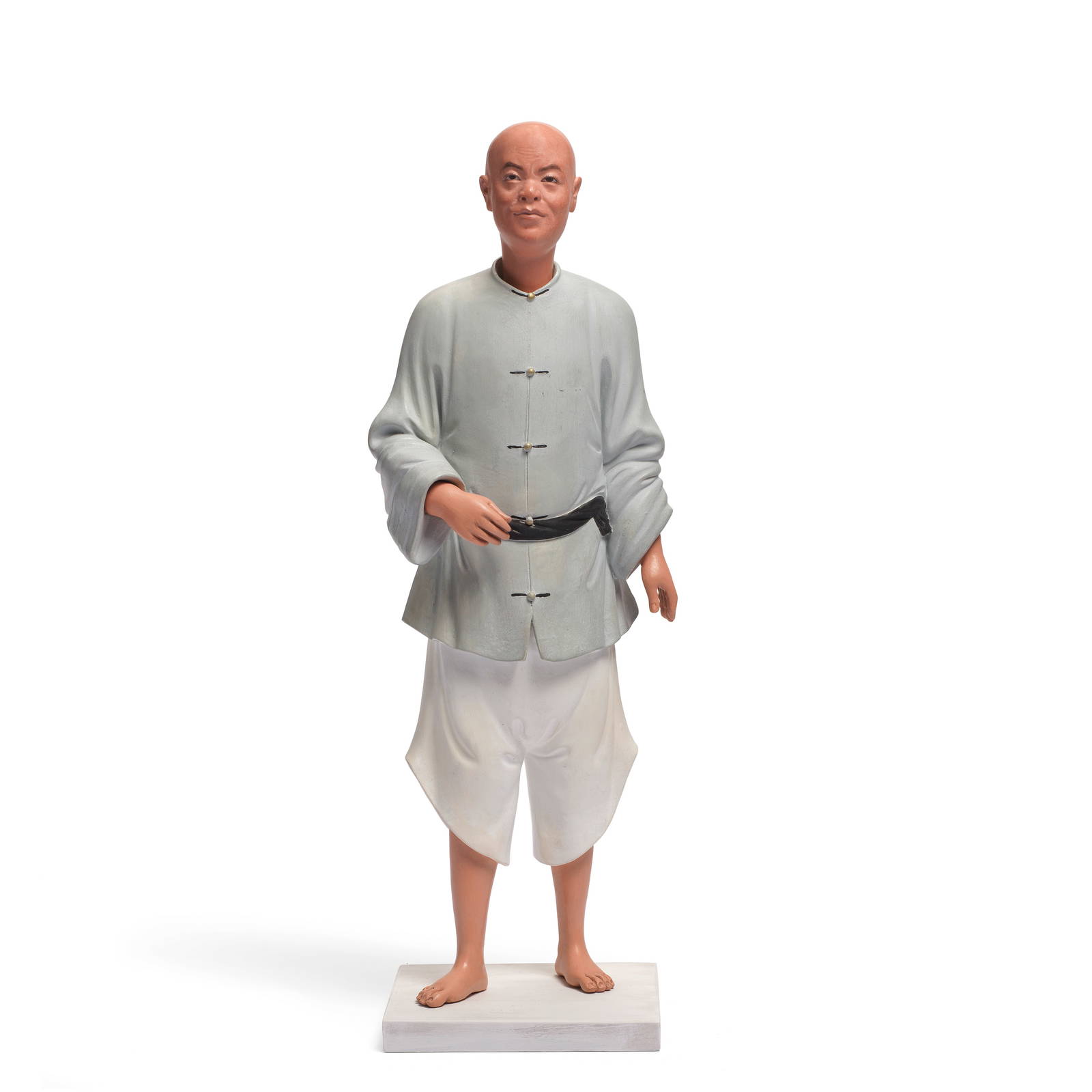 A RARE PAINTED-CLAY NODDING HEAD 'TEA PACKER' FIGURE Circa 1803 (4)