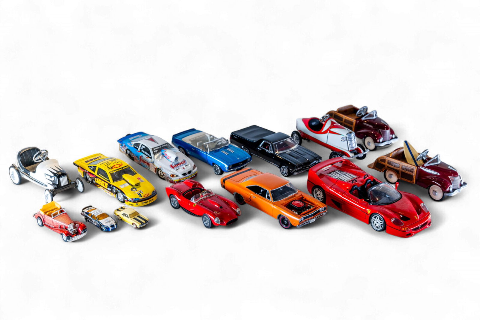 A grouping of various scale die-cast model cars, (1 of 1)