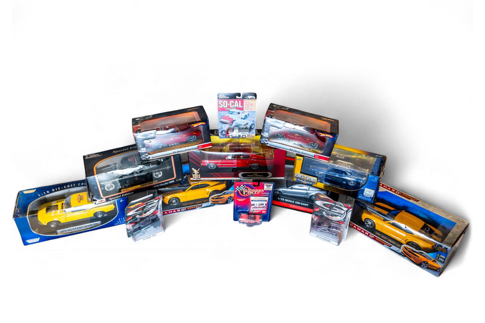 A grouping of boxed 1:12 scale American Muscle model cars, (1 of 1)