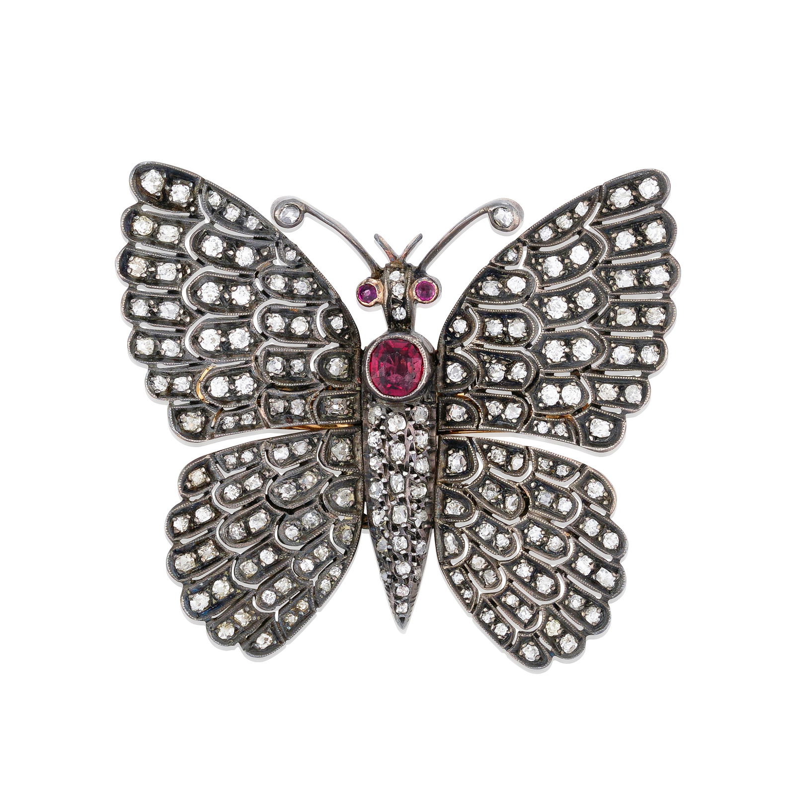 AN ANTIQUE DIAMOND 'EN TREMBLANT' BUTTERFLY BROOCH, FRANCE: AN ANTIQUE DIAMOND 'EN TREMBLANT' BUTTERFLY BROOCH, FRANCE Designed as a butterfly with old single and old mine-cut diamond wings, a bezel-set fancy-cut spinel body and circular-cut ruby eyes, silver