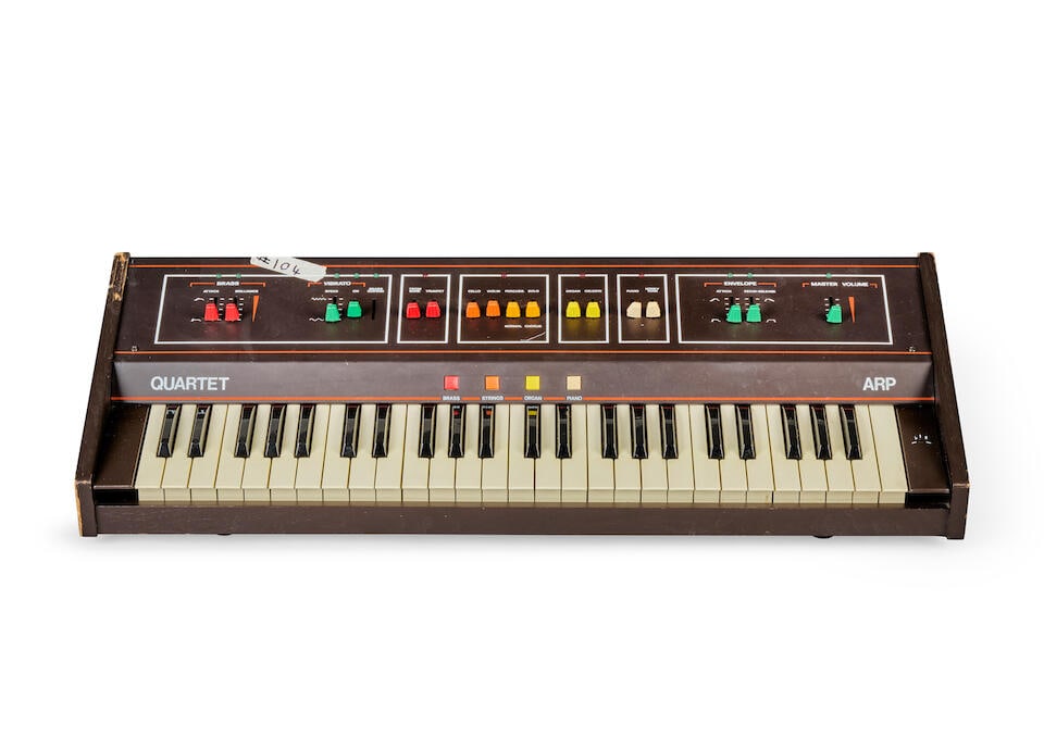 Gary Moore: An A.R.P. Quartet Orchestral Synthesiser, circa 1980,: Gary Moore: An A.R.P. Quartet Orchestral Synthesiser, circa 1980, serial no. 180/196 stamped on plate to underside, with Brass, Strings, Organ and Piano settings, 220 volt, 31in (78.5cm) wide x 14in (