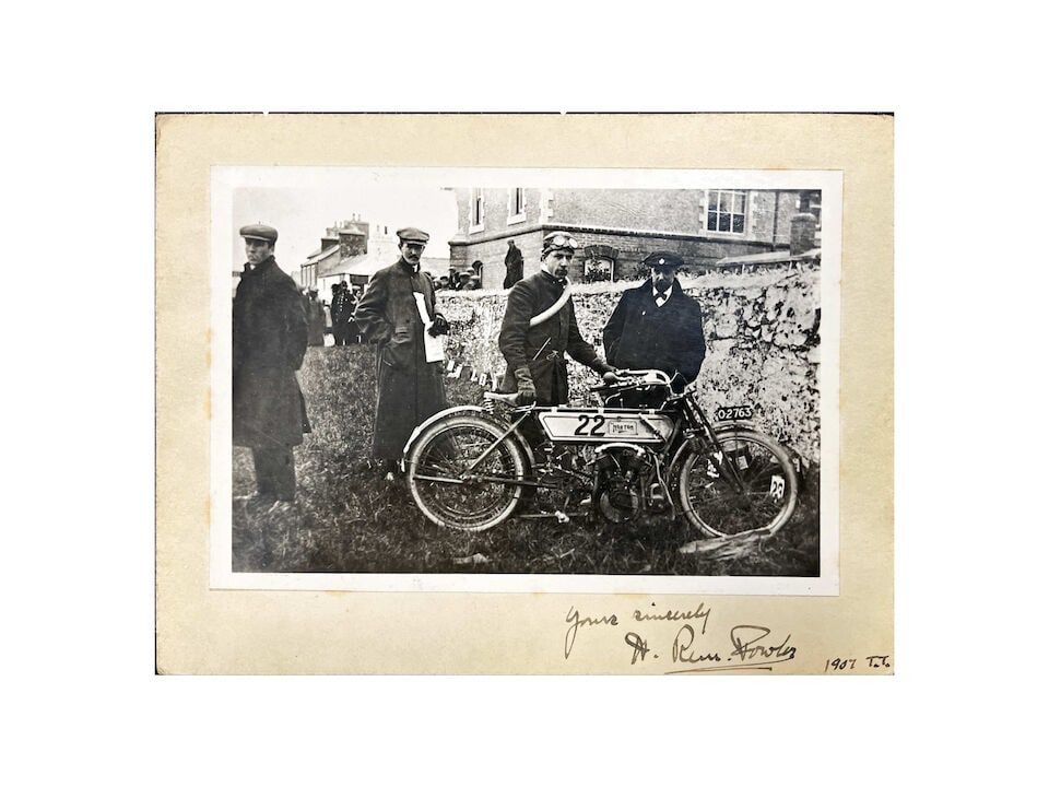 Rem Fowler autograph - a mounted photograph of Fowler with his Norton at the 1907 Isle of Man TT,: Rem Fowler autograph - a mounted photograph of Fowler with his Norton at the 1907 Isle of Man TT, signed to the mount: 'Yours sincerely, H. Rem Fowler, 1907 T.T.' Rem Fowler (Harry Rembrandt Fowler, 1
