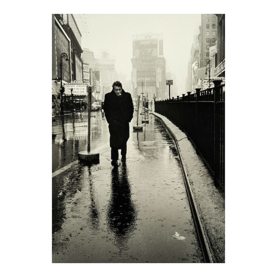 Dennis Stock (1928-2010); James Dean in Times Square, New York City;: Dennis Stock (1928-2010) James Dean in Times Square, New York City, 1955 Gelatin silver print; signed 'Dennis Stock' in pencil on the verso; framed. 18 7/8 x 13 1/4 in. (47.9 x 33.6 cm) sheet 19 7/8 x