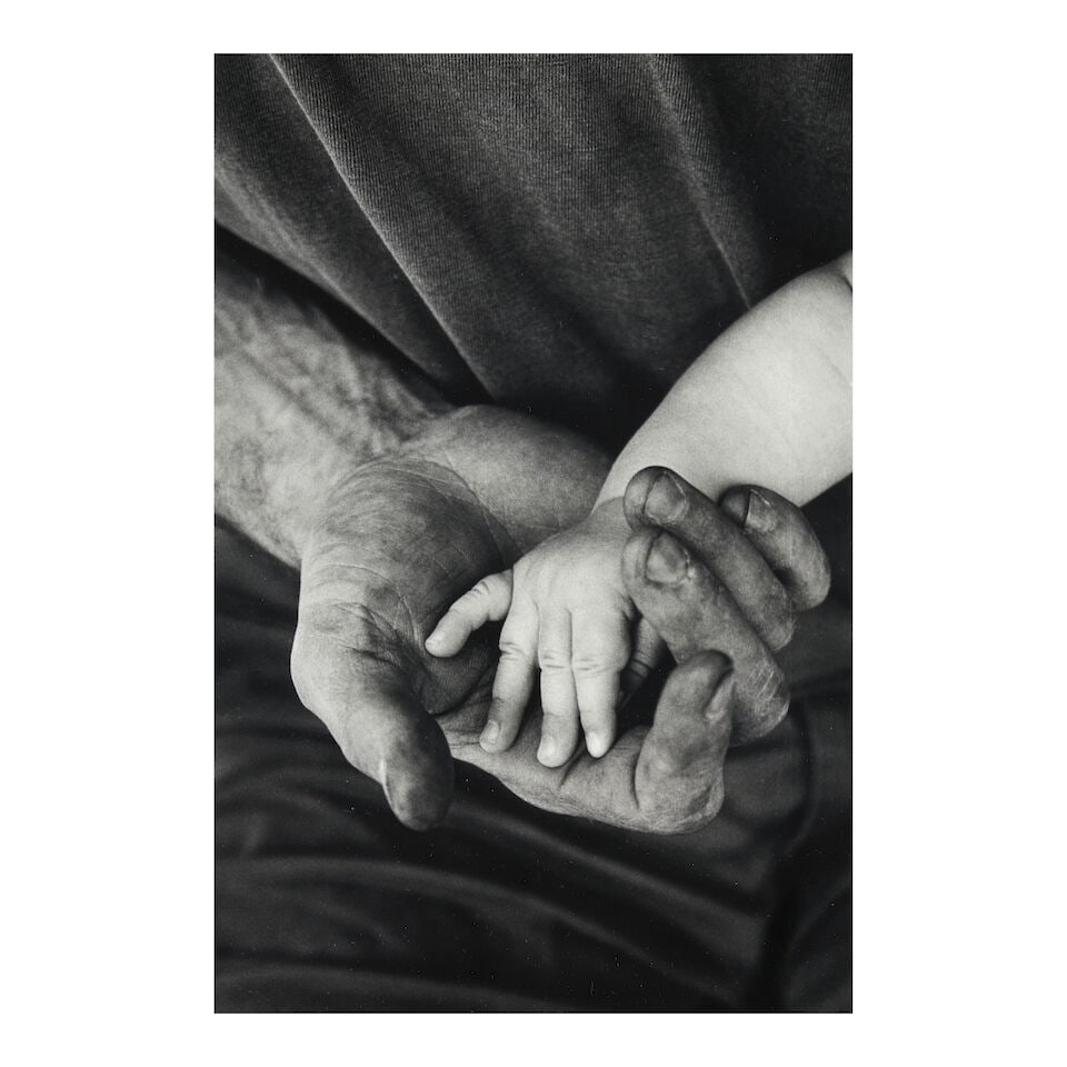 Elliott Erwitt (1928-2023); 'East Hampton' (Hands);: Elliott Erwitt (1928-2023) 'East Hampton' (Hands), 1995 Gelatin silver print; signed in ink in the margin, signed, titled, and dated in pencil on the reverse; framed. 12 1/8 x 8 1/8 in. (30.8 x 20.6 c