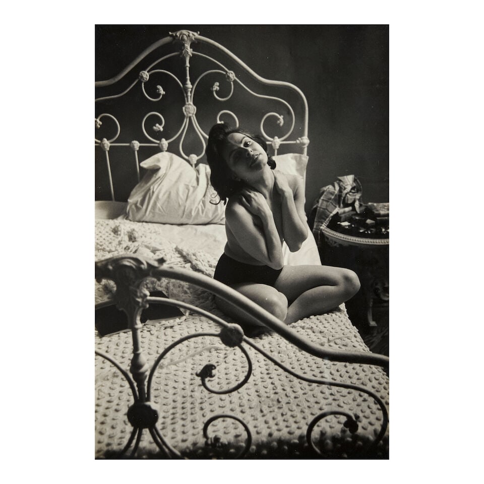 W. Eugene Smith (1918-1978); Model on Bed;: W. Eugene Smith (1918-1978) Model on Bed, Gelatin silver print, printed before 1978; the photographer's credit and estate stamps on the verso; framed. 13 7/16 x 9 1/8 in. (34.2 x 23.2 cm) mount 20 x 1