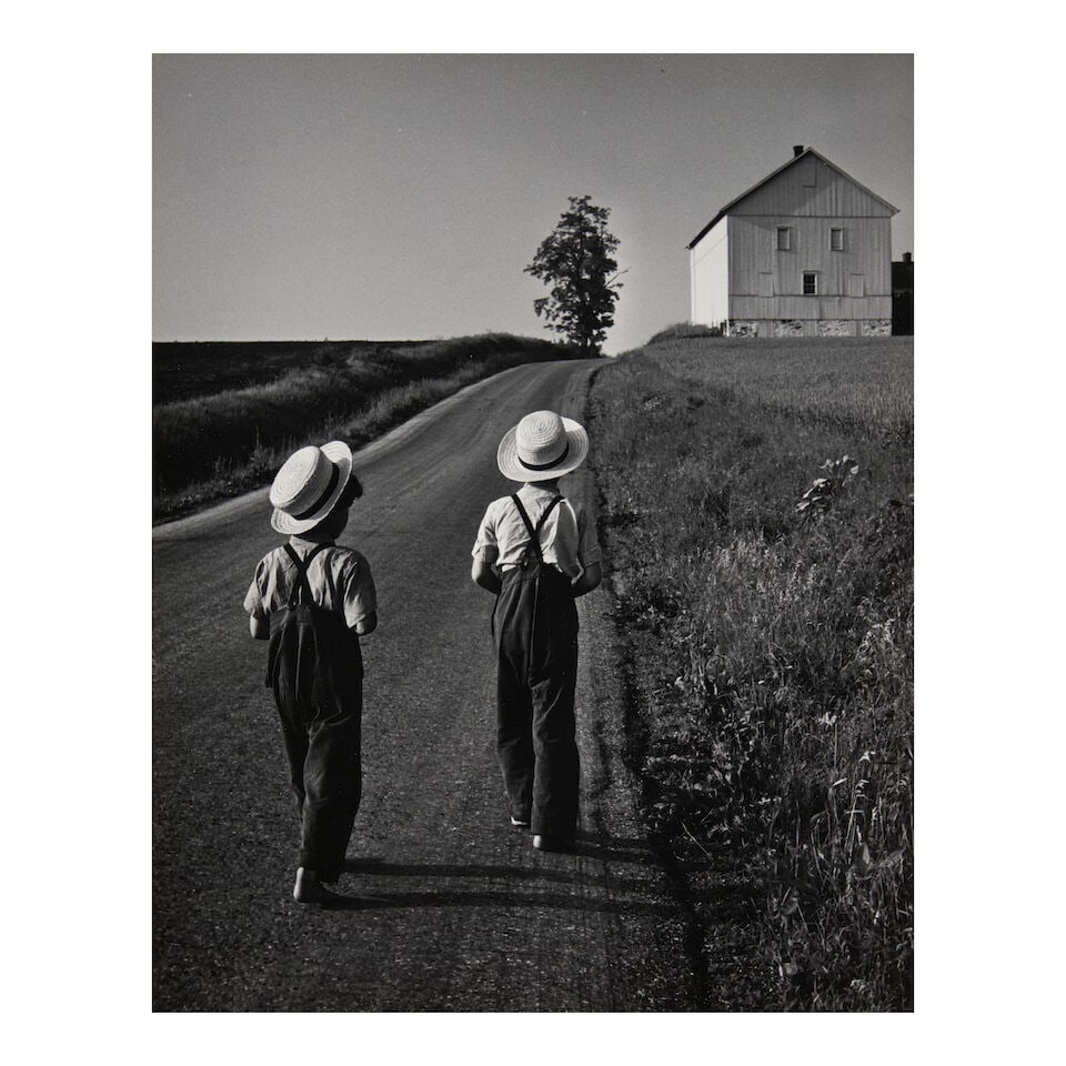 George Tice (1938-2025); Two Amish Boys, Lancaster, PA;: George Tice (1938-2025) Two Amish Boys, Lancaster, PA, 1962 Gelatin silver print; signed 'Geo. A. Tice' in pencil on the mount, titled and dated 1962 in pencil on the verso; mounted. 9 3/8 x 7 7/16 in