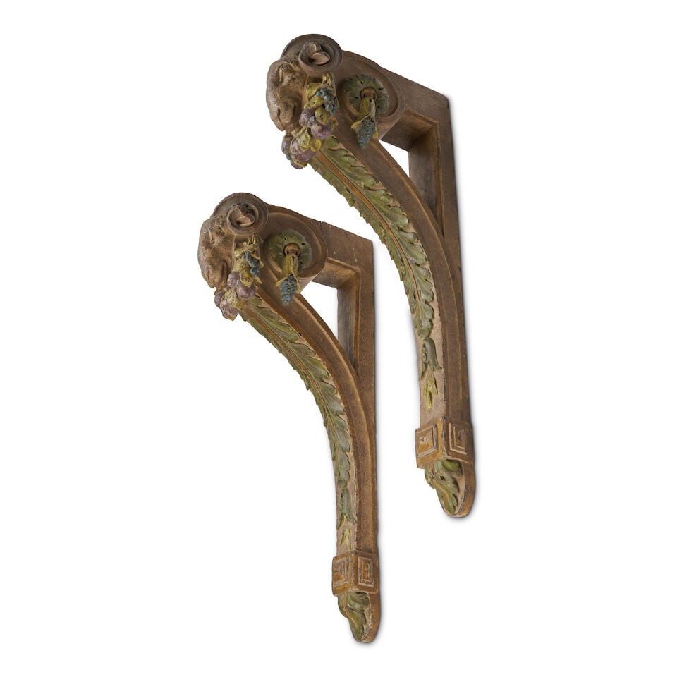 Pair of Polychrome Carved Ram's Head Table Brackets probably France, late 19th century: Pair of Polychrome Carved Ram's Head Table Brackets probably France, late 19th century The backs drilled for flush mounting, each wd. 5, dp. 12, ht. 25 1/2 in. Footnotes: Provenance Samuel Herrup, She