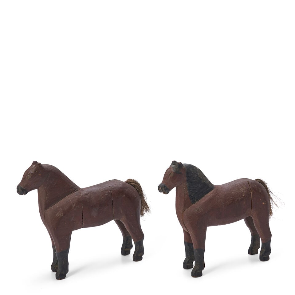 Pair of Carved and Painted Wooden Belgian Draft Horses late 19th or early 20th century: Pair of Carved and Painted Wooden Belgian Draft Horses late 19th or early 20th century each ht. 9 1/2, lg. 11 in. Lot to be sold without reserve. This lot is subject to the following lot symbols: