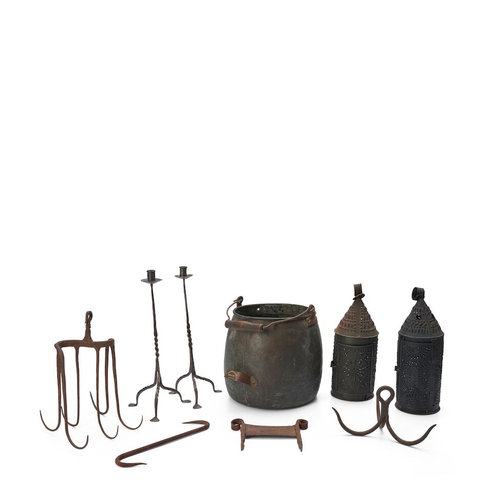 Group of Iron and Copper Kitchen Implements 18th century and later: Group of Iron and Copper Kitchen Implements 18th century and later consisting of a Pennsylvania copper bucket, a wrought iron boot scraper, a pair of 20th century wrought iron candlesticks, a pair of