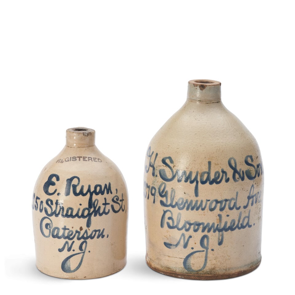 Two Cobalt-decorated Stoneware Jugs New Jersey, late 19th/early 20th century: Two Cobalt-decorated Stoneware Jugs New Jersey, late 19th/early 20th century The smaller jug inscribed 'E. Ryan, / 250 Straight St. / Paterson, / N.J.' and the other, 'H. Snyder & Son / 279 Glenwood