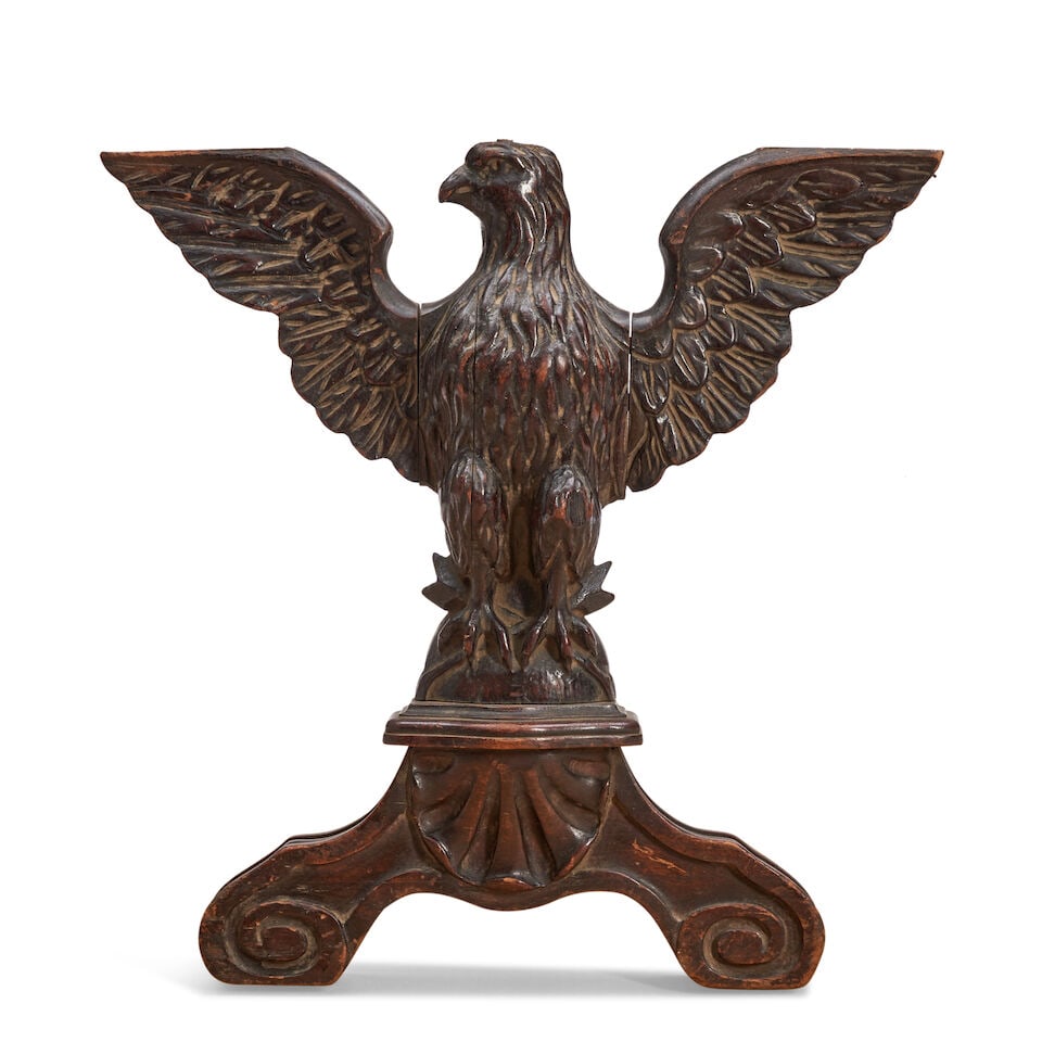 Carved Eagle Plaque United States, c. 1900: Carved Eagle Plaque United States, c. 1900 Assembled relief-carved figure of a spread-wing eagle perched on sphere, mounted on shell- and volute-carved arch base, the top of head and wings truncated