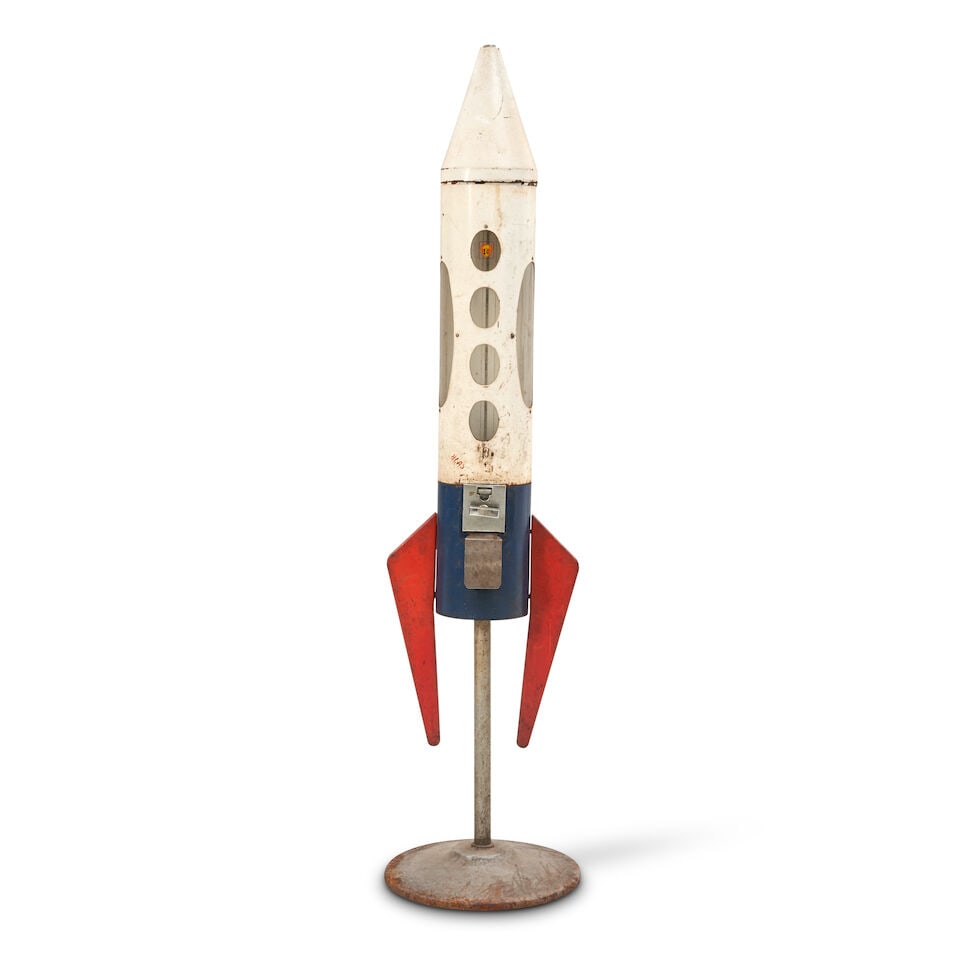 Rocketship Gumball Machine United States, c. 1950: Rocketship Gumball Machine United States, c. 1950 Painted iron, aluminum, and clear plastic spaceship on original weighted stand, impressed serial number H05692, diam. 15, ht. 63 in. Footnotes: Proven