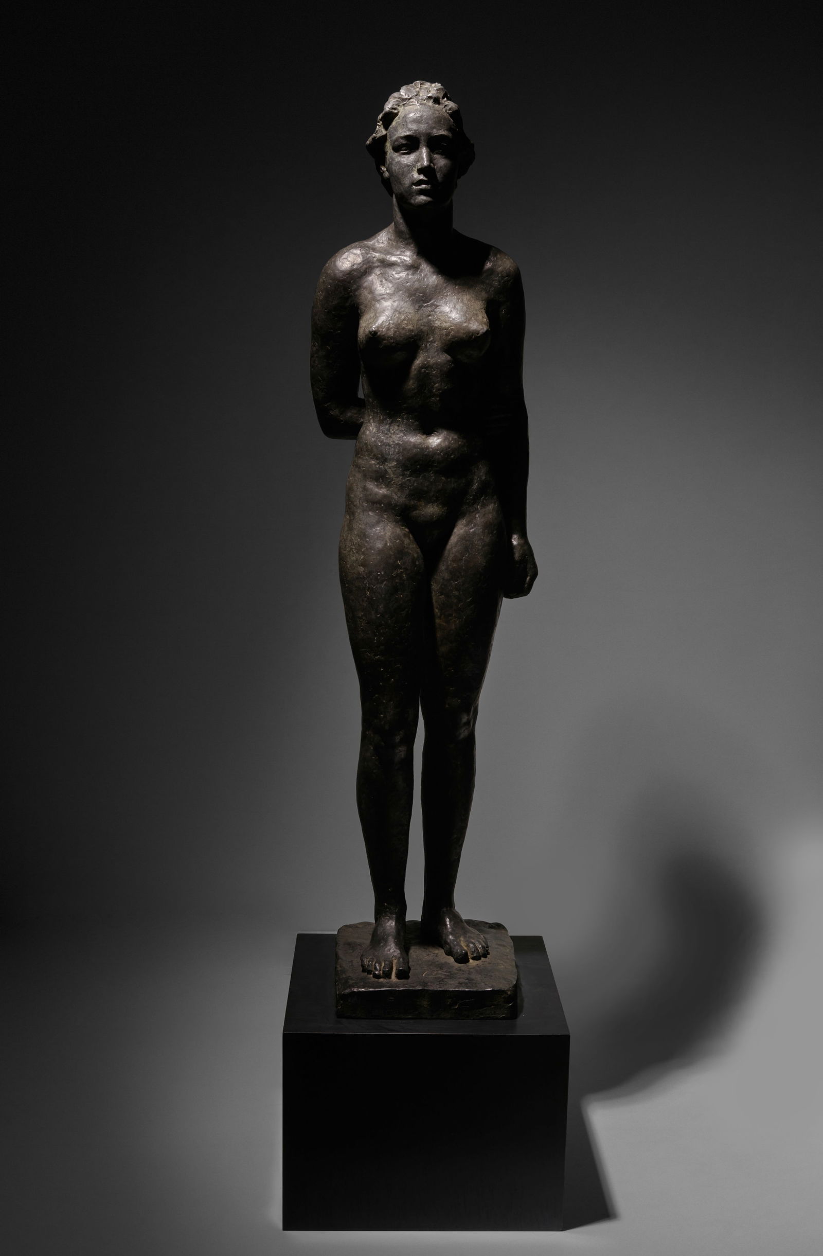 GEORG KOLBE (1877-1947) Lauschende 52 x 12 5/8 x 7 7/8 in (132 x 32 x 20 cm) (Conceived in 1941-...: GEORG KOLBE (1877-1947) Lauschende signed with the artist's initials 'GK' (on the top of the base) and stamped with the foundry mark 'H Noack Berlin' (on the back of the base) zinc with black patina 5