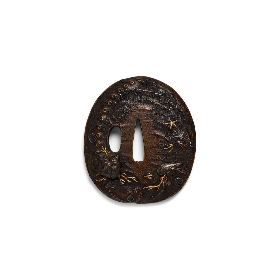GENSHŌSAI MASAHARU (ACTIVE CIRCA 1724) A Shinchū (Brass) Tsuba (Hand Guard) Edo period...