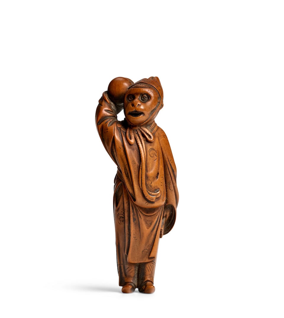 MEIKEISAI HŌJITSU (ACTIVE 19TH CENTURY) A Large Wood Netsuke of a Sarugaku Performer Edo pe...