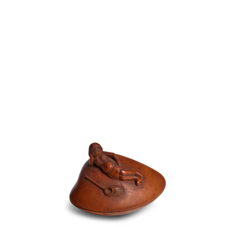 ARTIST UNKNOWN A Large Wood Netsuke of a Diver Resting on a Clam Edo period (1615-1868), 19th ce...