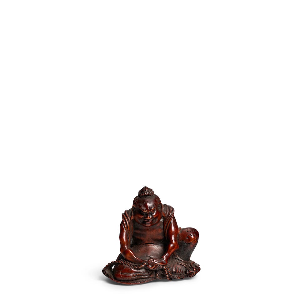 MITSUNOBU (ACTIVE 19TH CENTURY) A Wood Netsuke of a Nio Guardian Edo period (1615-1868), 19th ce...