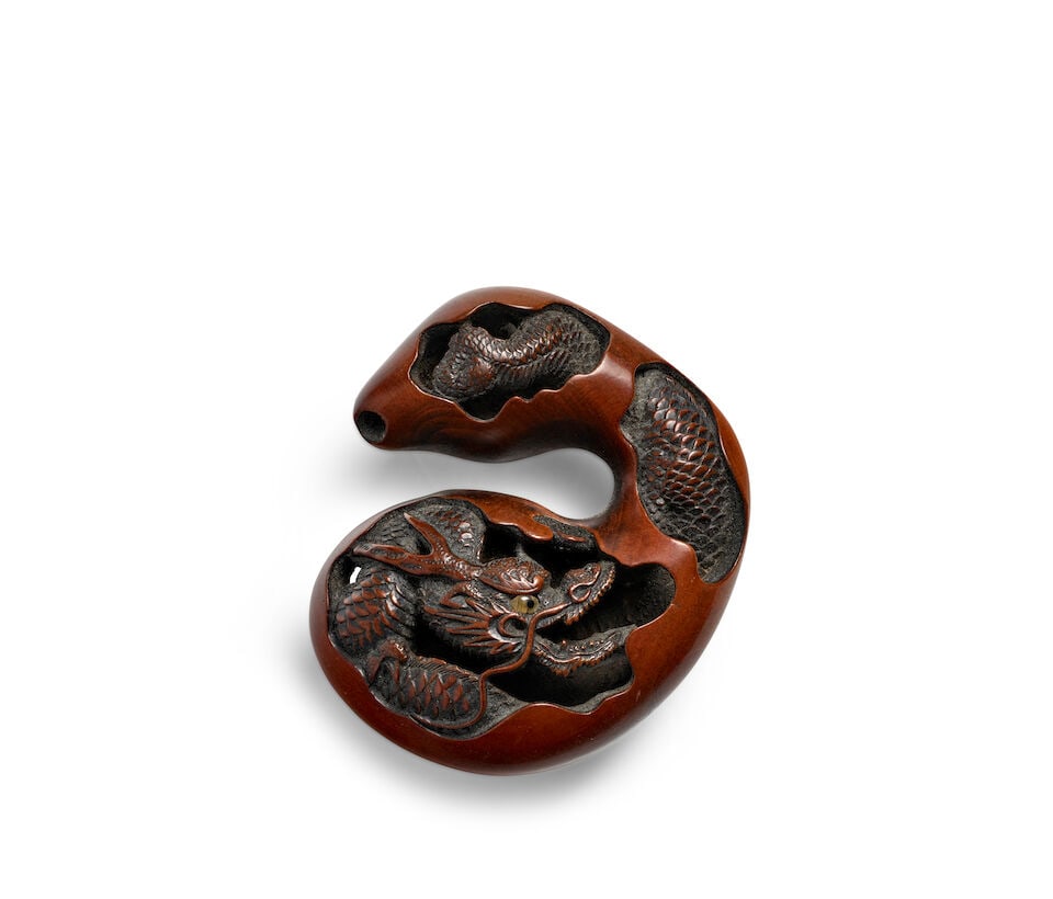 NAITŌ TOYOMASA (1773-1856) A Wood Netsuke of a Dragon in a Gourd Edo period (1615-1868), 18...