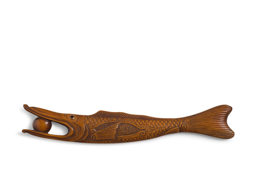 A WOOD SASHI NETSUKE OF A FISH Edo period (1615-1868), 18th/19th century