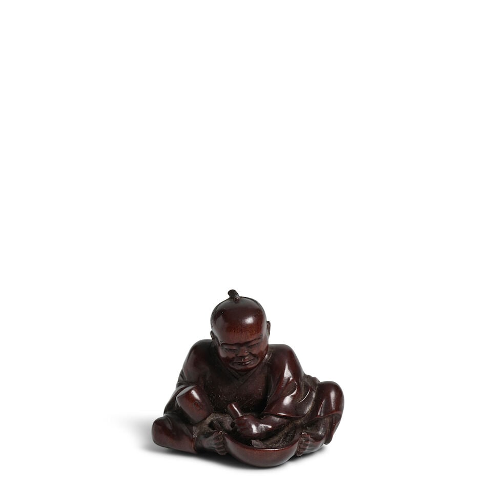 RYŪKŌSAI JUGYOKU II (1815-1877) A Wood Netsuke of a Mask Carver Edo period (1615-1868)...