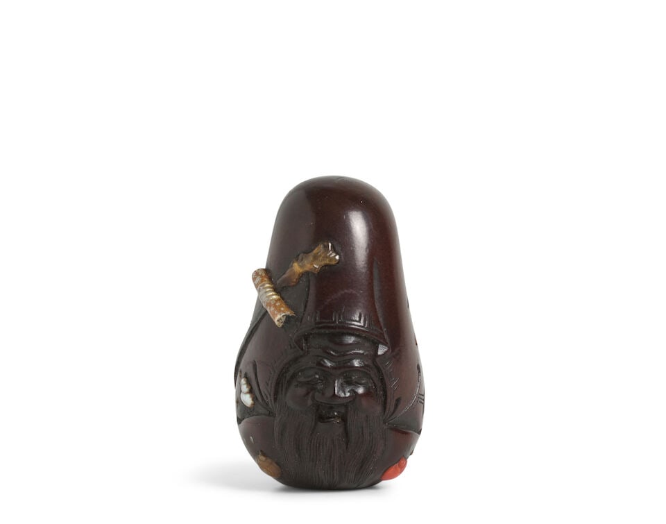 RYŪGYOKU (ACTIVE 19TH CENTURY) A Wood Netsuke of a Stylized Fukurokuju Edo period (1615-186...