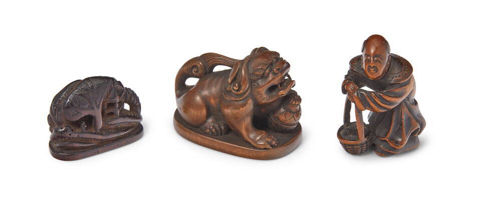 A GROUP OF THREE WOOD NETSUKE Edo period (1615-1868), 19th century (3)