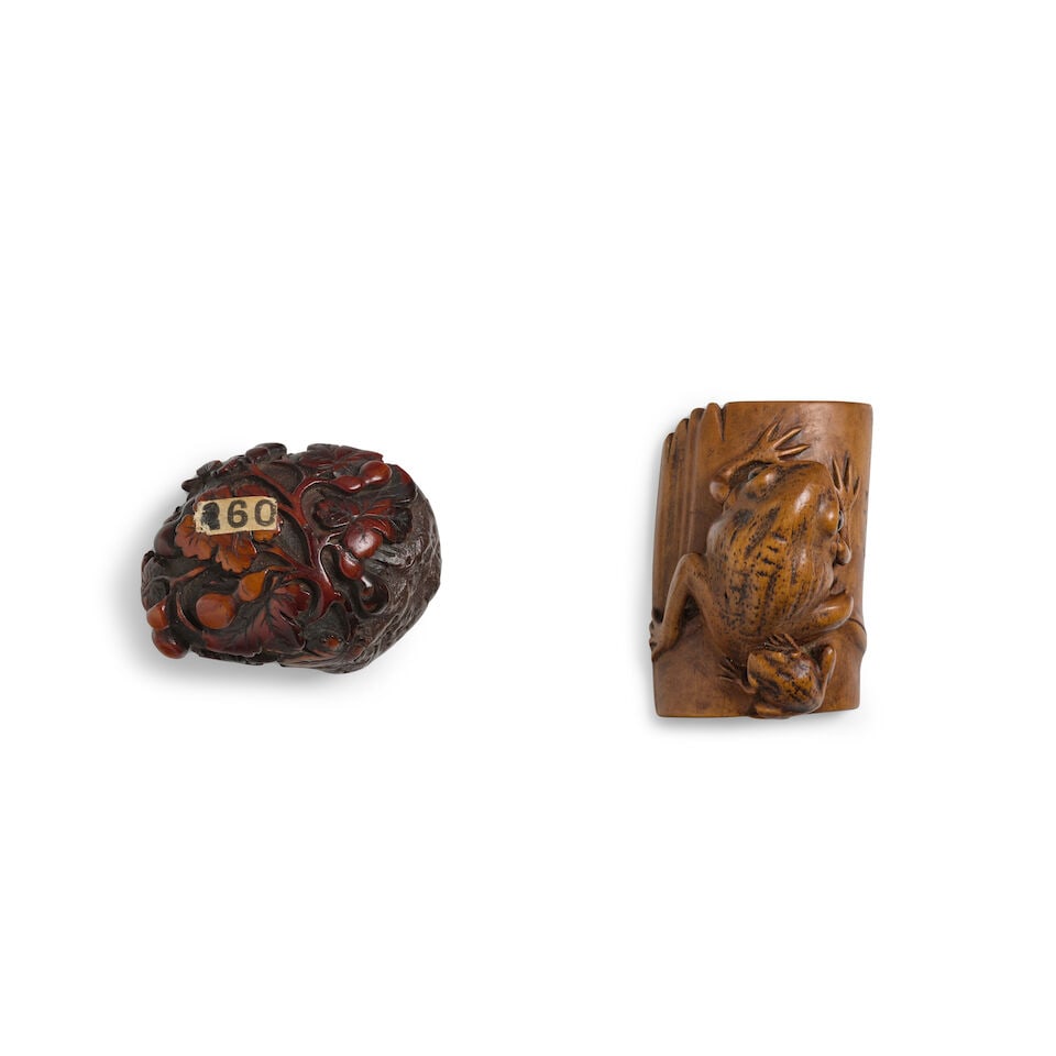 A WOOD NETSUKE AND AN UMIMATSU NETSUKE Edo period (1615-1868) or Meiji era (1868-1912), 19th cen...