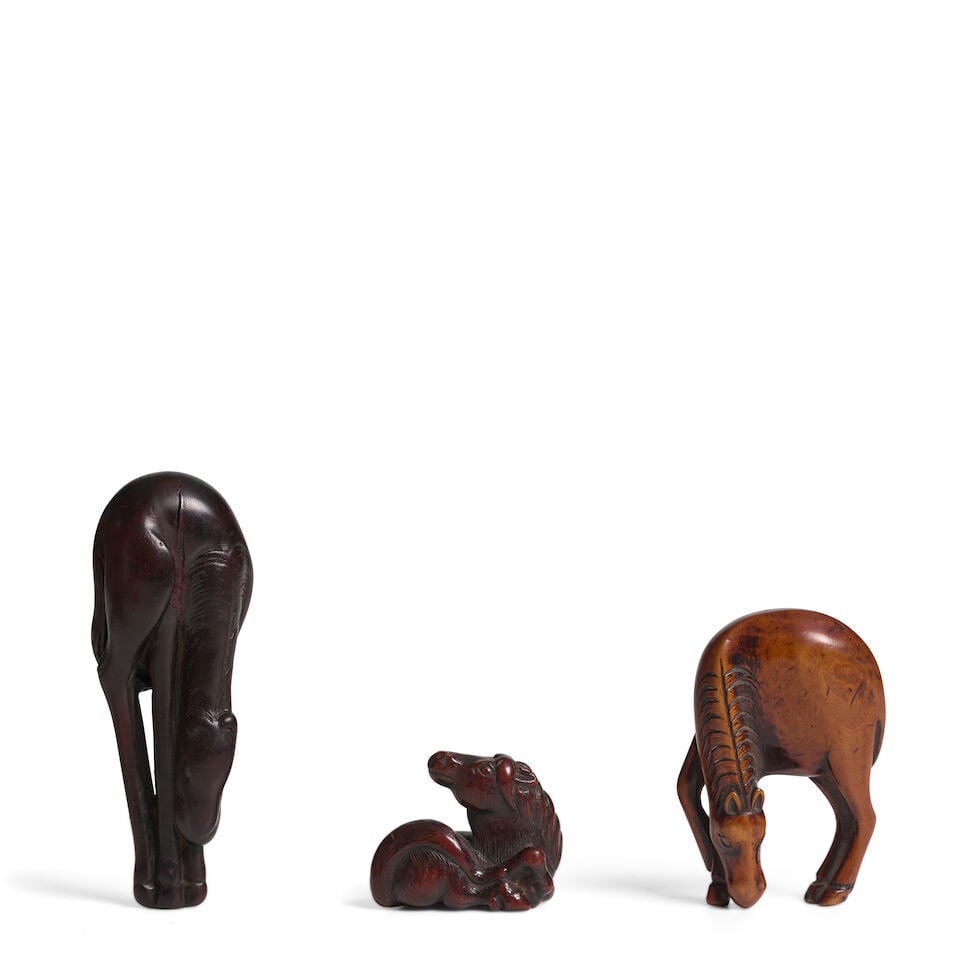 THREE WOOD NETSUKE OF HORSES Edo period (1615-1868), 18th/19th century (3)