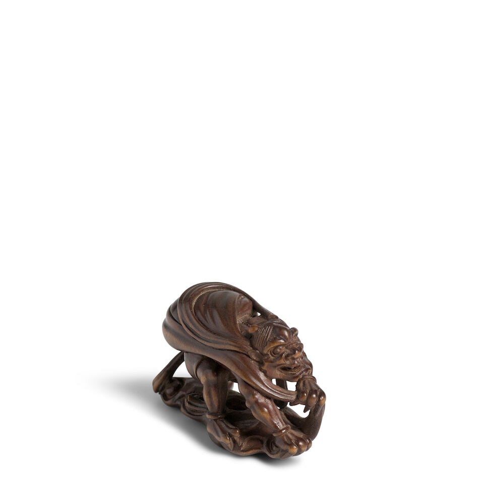 SŌKEI (DATES UNKNOWN) A Wood Sō-School Netsuke of Fūjin Meiji (1868-1912) or Tais...