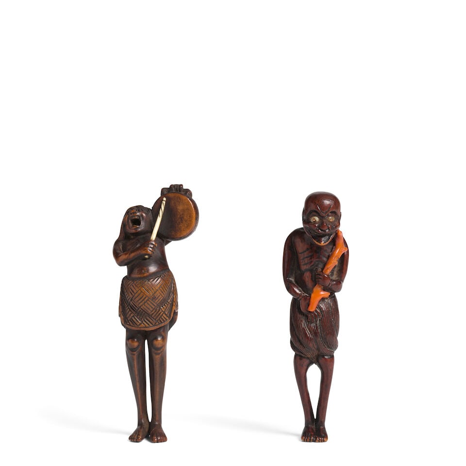 TWO TALL WOOD NETSUKE Edo period (1615-1868), 18th/19th century (2)