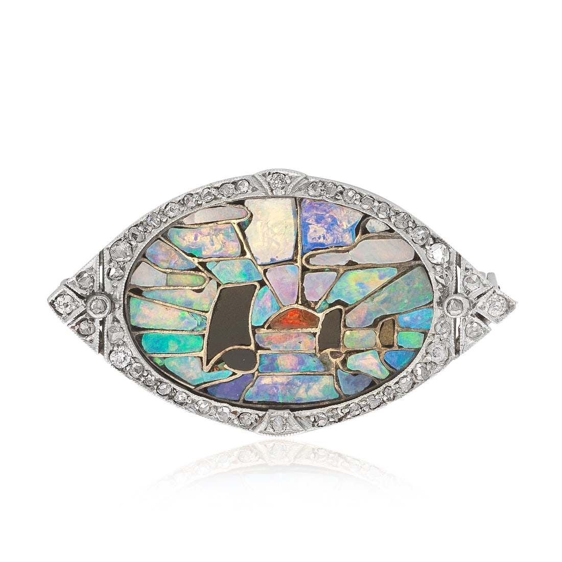 ATTRIBUTED TO ARCHIBALD KNOX FOR LIBERTY & CO: ART NOUVEAU DIAMOND, ONYX AND OPAL MOSAIC BROOCH,...: ATTRIBUTED TO ARCHIBALD KNOX FOR LIBERTY & CO: ART NOUVEAU DIAMOND, ONYX AND OPAL MOSAIC BROOCH, CIRCA 1900 The brooch inlaid with opal and onyx, depicting a fleet of sailboats, to an old cushion-shap