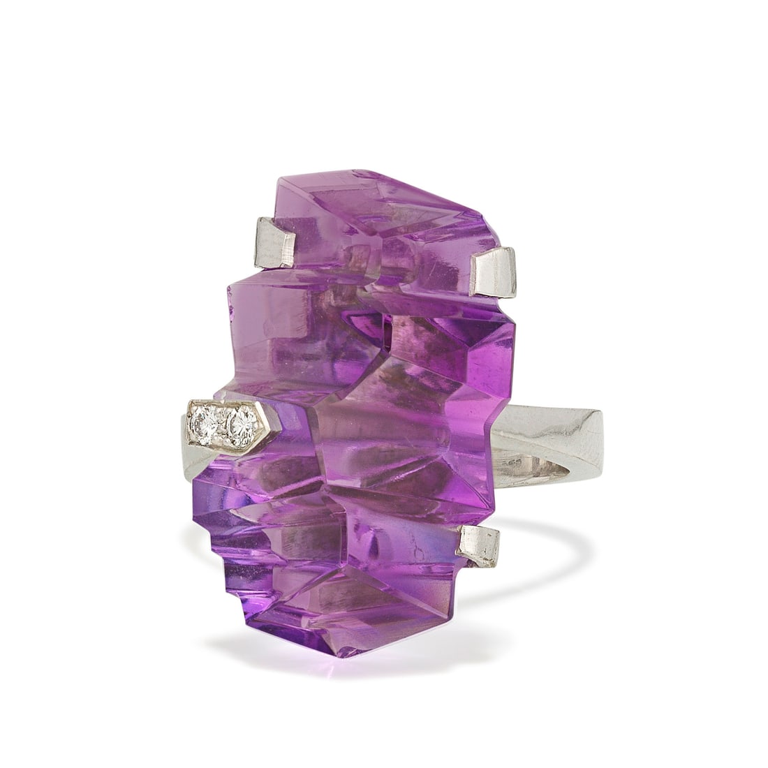 GRIMA: AMETHYST AND DIAMOND RING: GRIMA: AMETHYST AND DIAMOND RING The fancy-cut amethyst accented by brilliant-cut diamonds, signature and London hallmark both rubbed, ring size approx. K Footnotes: Please note this lot has VAT at th