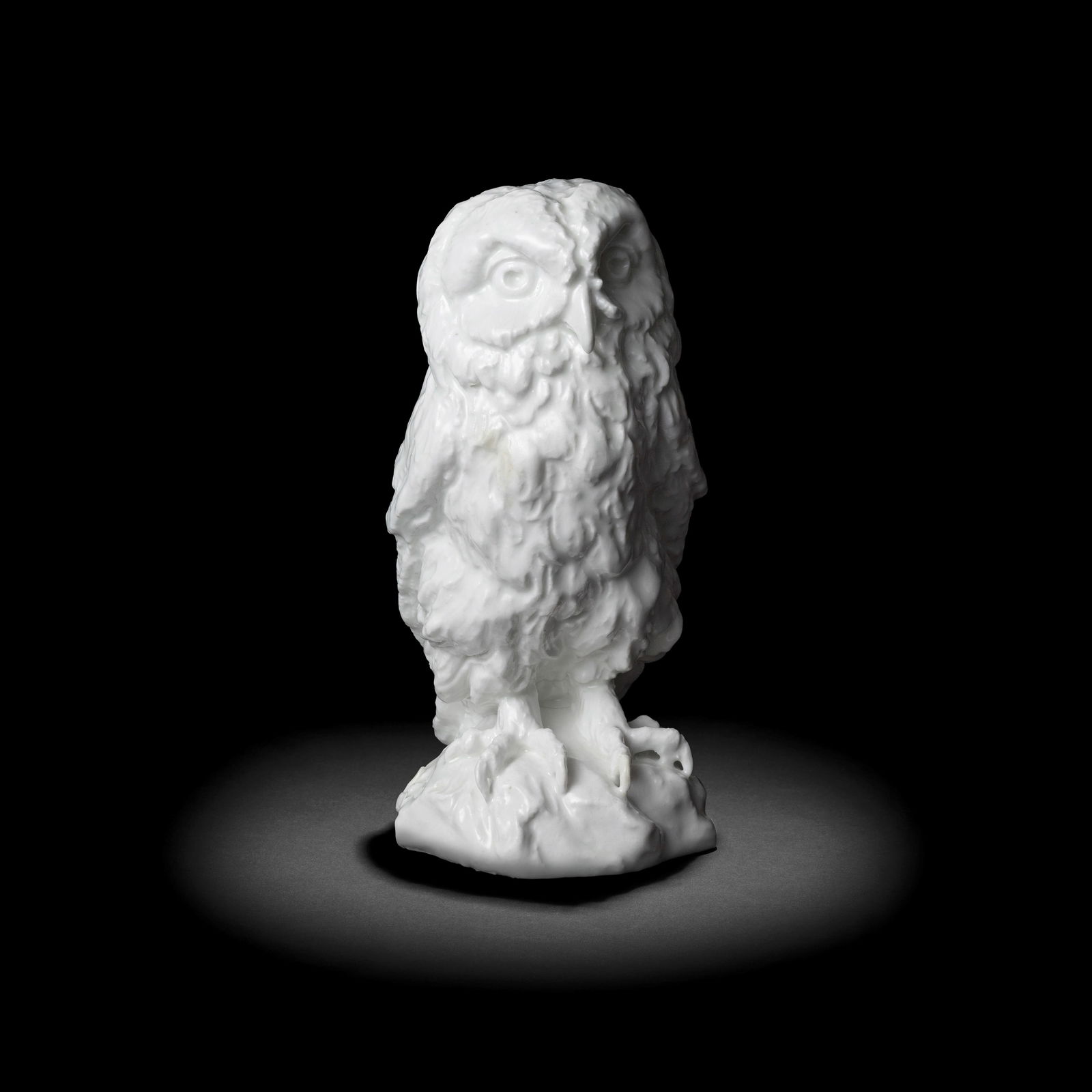 A fine Chelsea white model of an owl, circa 1748-50: A fine Chelsea white model of an owl, circa 1748-50 The bird naturalistically modelled in great detail, its talons firmly gripping the irregular rocky base upon which it stands, 20.8cm high Footnotes:
