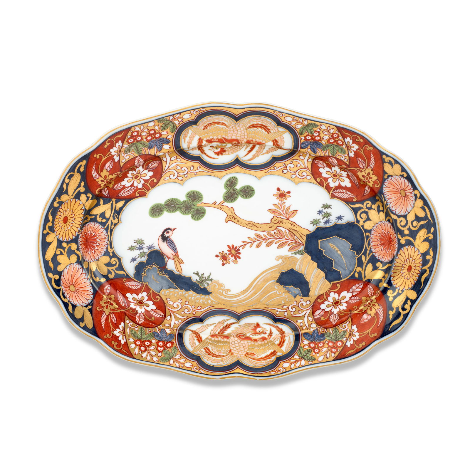 A rare and large Loosdrecht charger, circa 1778-82: A rare and large Loosdrecht charger, circa 1778-82 Of oval shape, with a shallow, broad rim, decorated in imitation of Japanese Imari ware, a bird perched on a rockwork ground, looking towards a pine