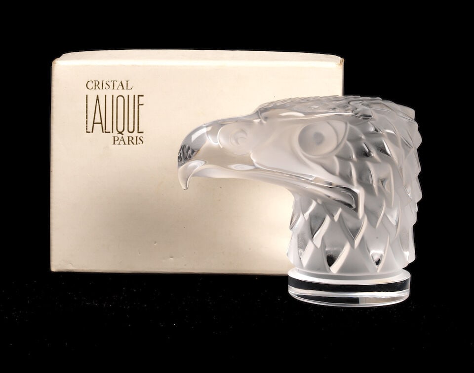 A boxed 'Tete d'Aigle' (Eagle's Head) glass mascot/paperweight, by Cristal Lalique, French, post...: A boxed 'Tete d'Aigle' (Eagle's Head) glass mascot/paperweight, by Cristal Lalique, French, post-War, engraved 'Lalique ® France' and with labels 'Made in France' and hand-numbered '11808' under