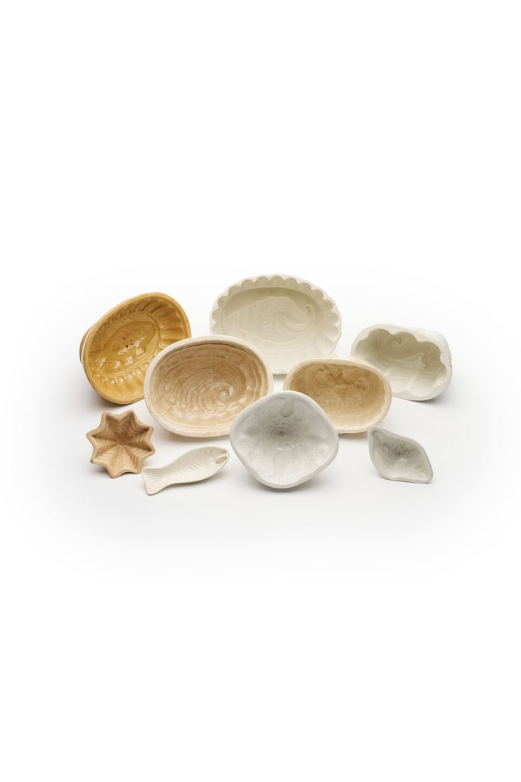 A group of eight Victorian and later ceramic jelly moulds of sealife, variously stamped with mak... (1 of 1)