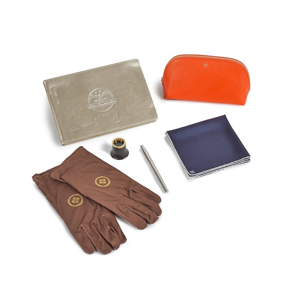 Patek Philippe. A Lot of accessories (5) Patek Philippe. Lot d'accessoires (5) (1 of 2)