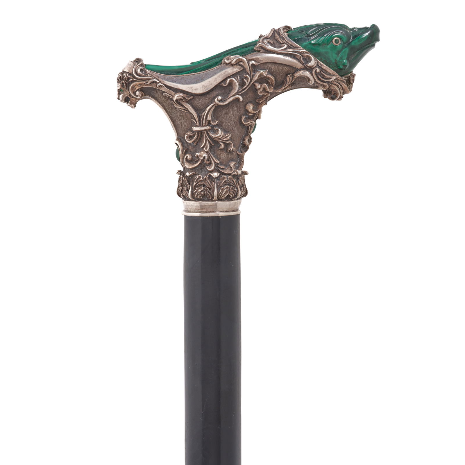 A RUSSIAN MODERNE EMERALD INSET CARVED MALACHITE AND 875 STANDARD SILVER DOLPHIN CANESt. Petersb...: A RUSSIAN MODERNE EMERALD INSET CARVED MALACHITE AND 875 STANDARD SILVER DOLPHIN CANE St. Petersburg, 1890-1900 Depicting a carved malachite dolphin cradled by a stylized silver wave decorated with ma