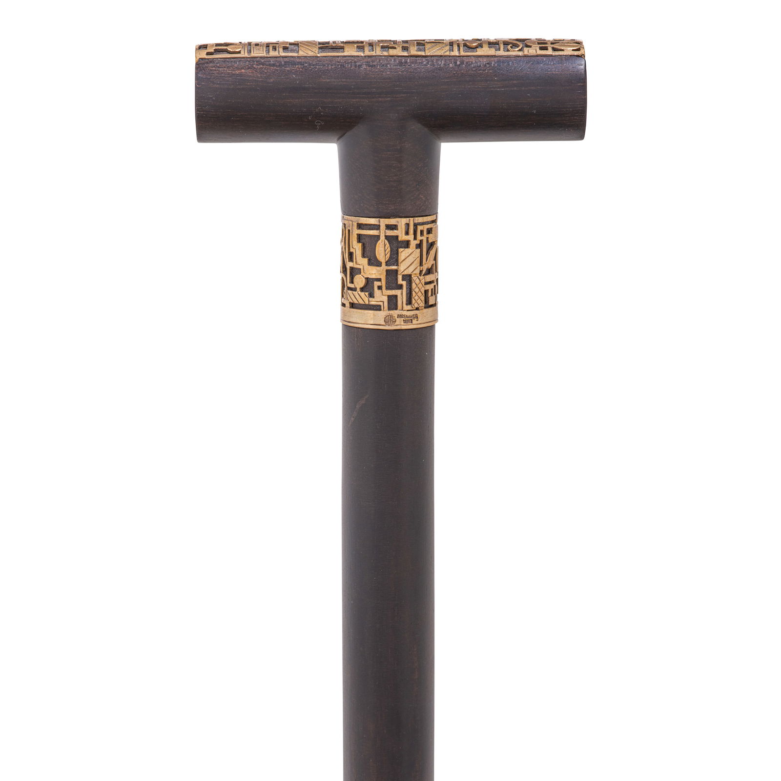 AN AUSTRIAN ART DECO ROSE-GOLD OVERLAY HIEROGLYPHIC CANEExecuted by Karl Hagenauer, Vienna, 1920...: AN AUSTRIAN ART DECO ROSE-GOLD OVERLAY HIEROGLYPHIC CANE Executed by Karl Hagenauer, Vienna, 1920-1924 The tau-shaped handle overlaid with cut brass rose gold gilt l'art nègre style band decorate