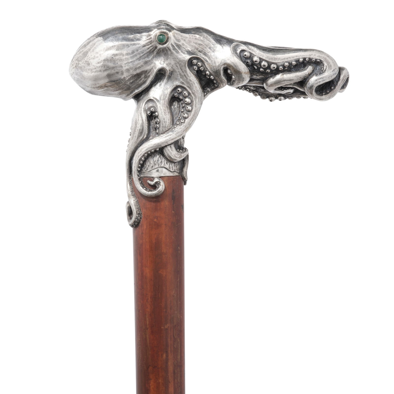 A DANISH EMERALD INSET 826 STANDARD SILVER OCTOPUS CANEDesigned and executed by Christian Fjerdi...: A DANISH EMERALD INSET 826 STANDARD SILVER OCTOPUS CANE Designed and executed by Christian Fjerdingstad, Skagen, Denmark, circa 1912-1914 The handle in the form of an octopus with inset emerald caboch