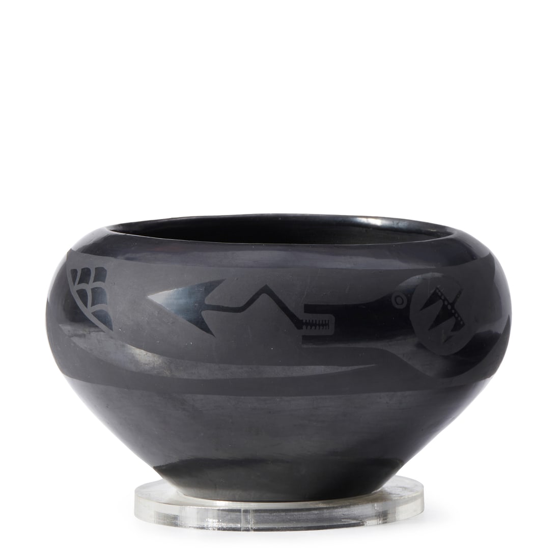 A Maria Martinez blackware pottery bowl: Maria Martinez San Ildefonso Pueblo, (1887-1980), a blackware pottery bowl, the shoulder with a matte frieze enclosing an Avanyu serpent and rainclouds, signed on the underside: Marie. height 5in, dia